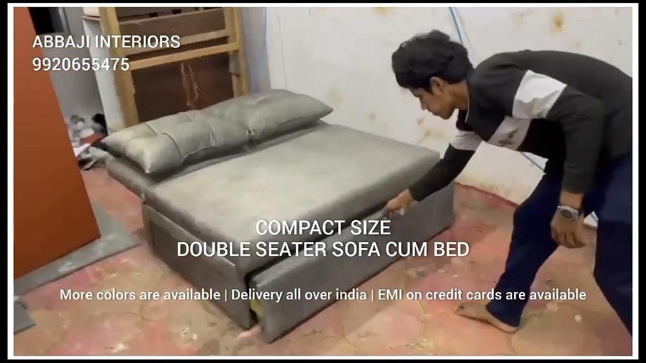 The compact size double seater sofa cum bed s...