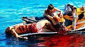 A Shark Hunts a Group of Teenagers Stuck in The Sea on a Jet Ski